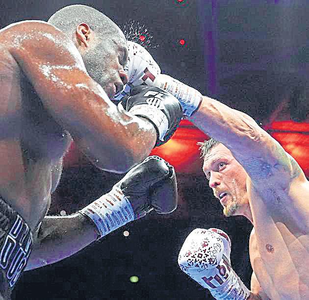 Usyk becomes two-time undisputed heavyweight champ after Dubois KO