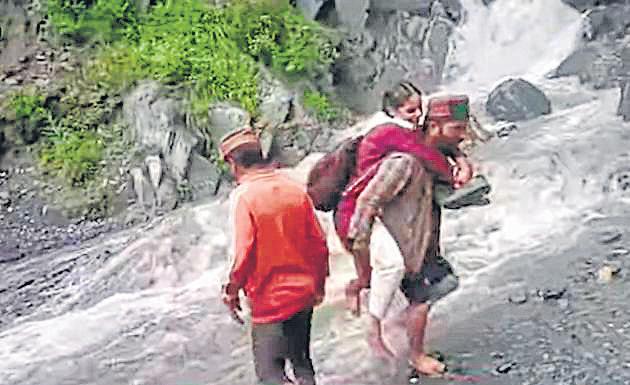 No bridge: Children forced to wade through swollen nullah to reach school in Bharmour