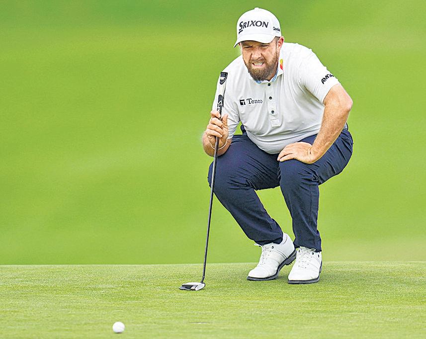 Lowry feels the gloom as Scheffler powers on