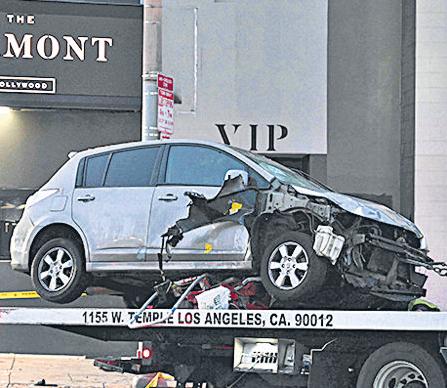 Car drives into LA crowd, injures 30