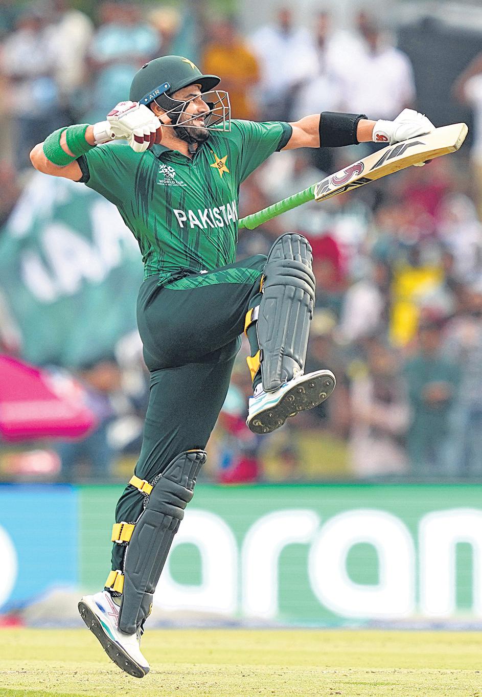 Farhan century and spin punch help Pak crush Namibia, enter Super 8s