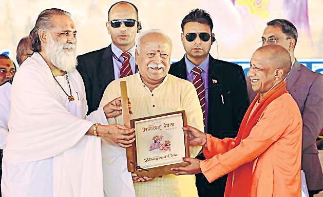 Yogi hits out at RSS critics, says no church funds it
