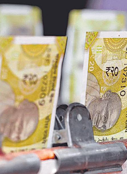 Rupee slides to record low on global jitters, outlook fragile