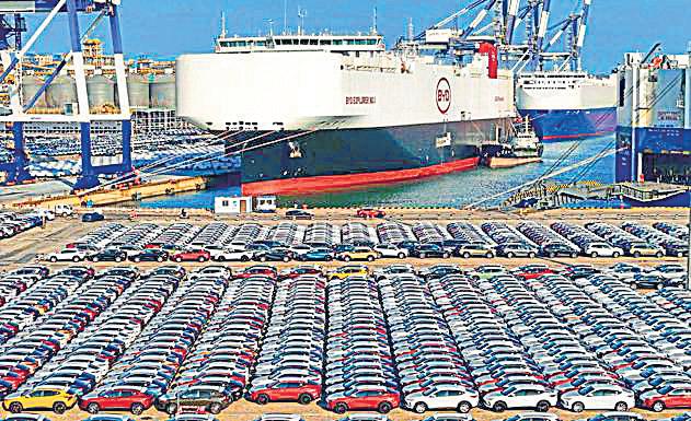 Auto firms go global on export boom