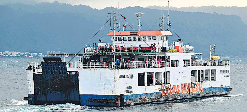 Indonesian rescuers widen search for 30 missing after ferry capsizes