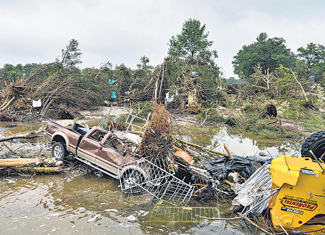 Hopes fade for missing Texas flood victims as death toll mounts to 100