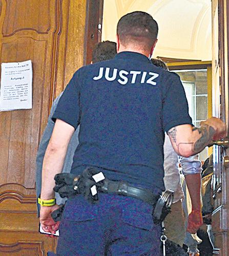 German doc goes on trial, accused of murdering patients