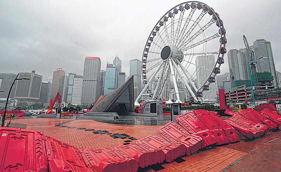 Typhoon topples trees, causes major flight disruptions in Hong Kong, southern China