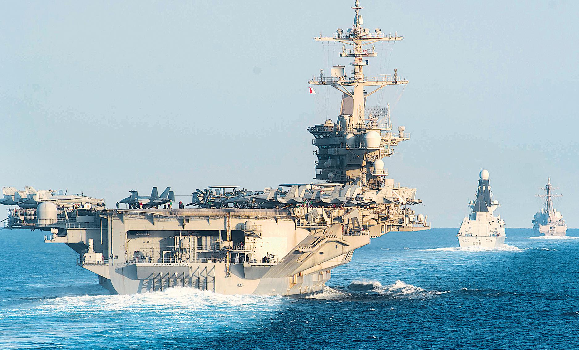 Trump says Iran wants talks as US carrier group arrives
