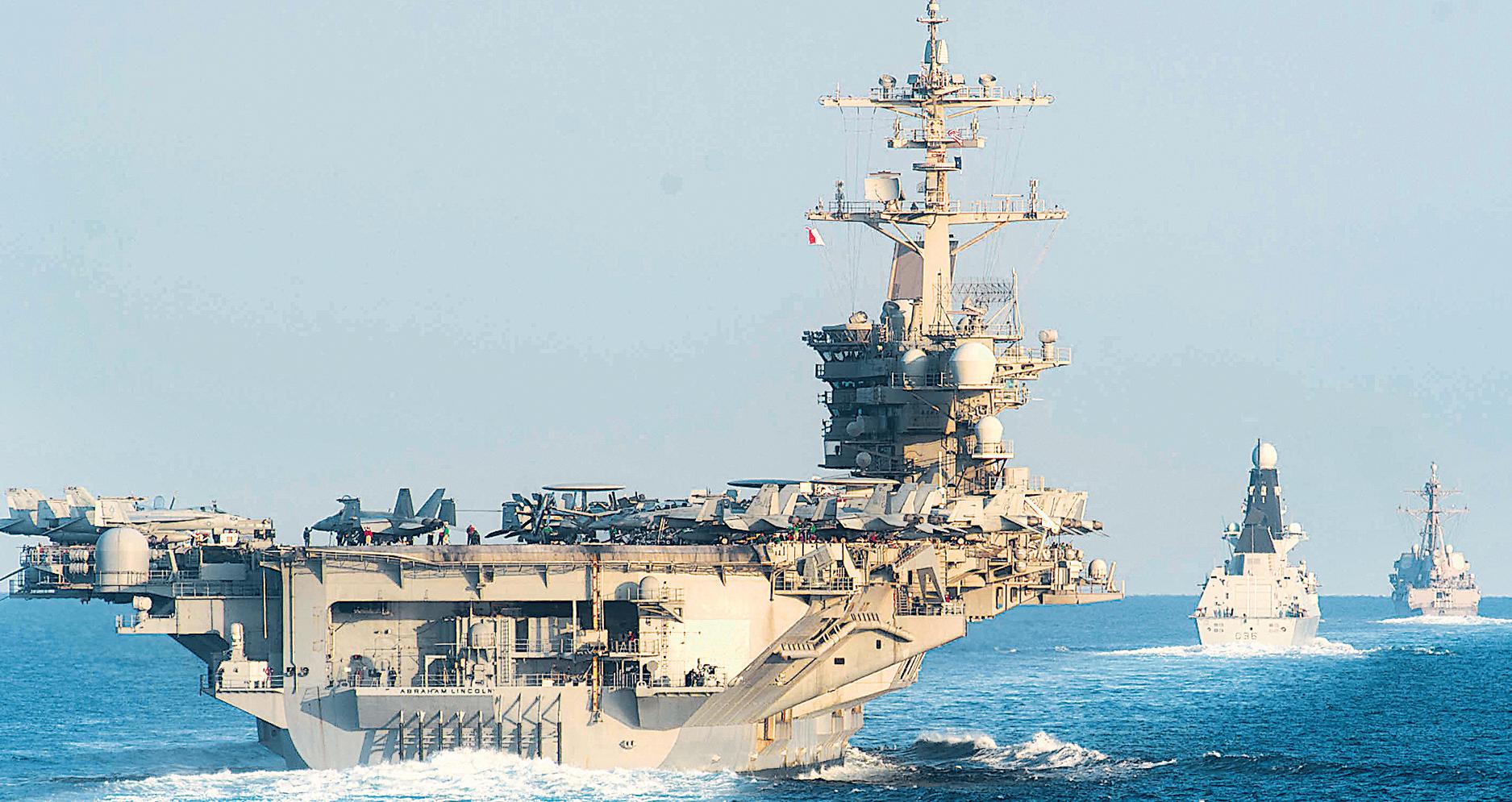 Trump says Iran wants talks as US carrier group arrives
