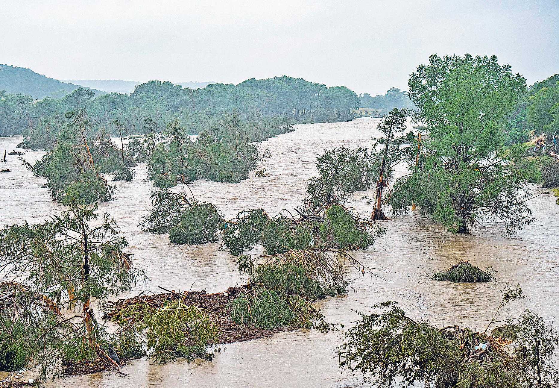 24 dead in Texas floods; 2 dozen girls missing