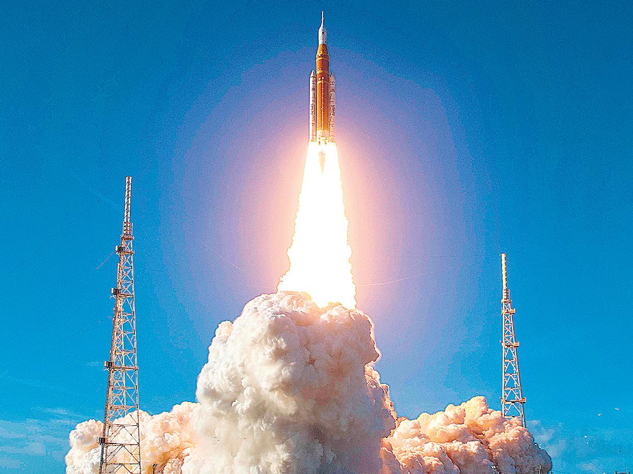 Astronauts reach safe orbit in Nasa’s Moon mission
