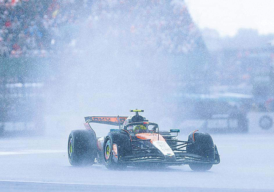 Emotional Norris wins epic rain-hit British GP