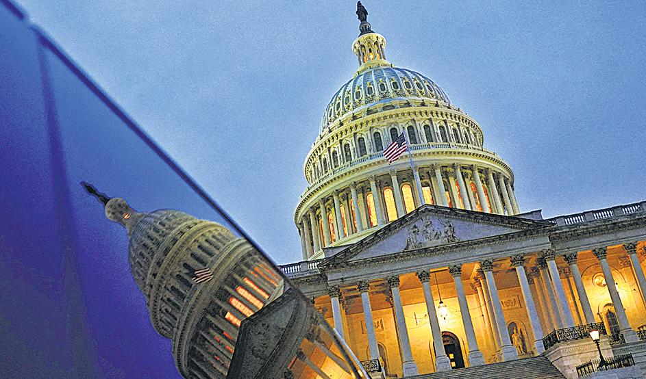 Gold hits record, dollar drops as US govt shutdown looms