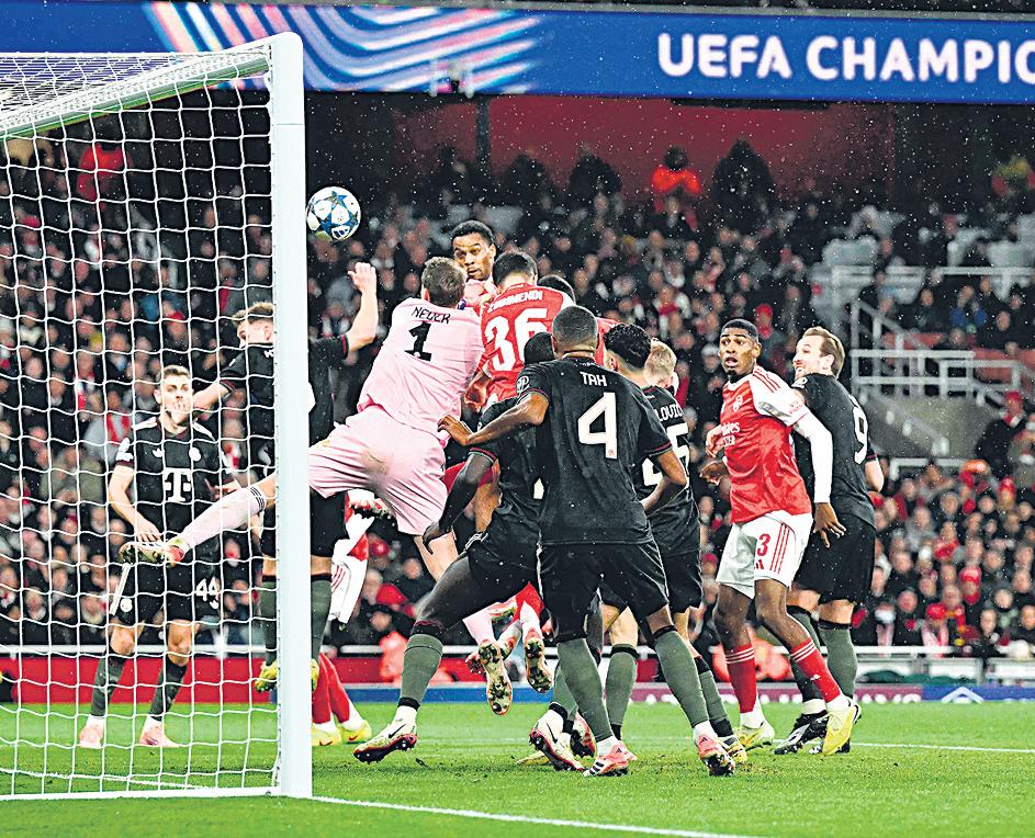 Arsenal soar against Bayern, Liverpool sink versus PSV