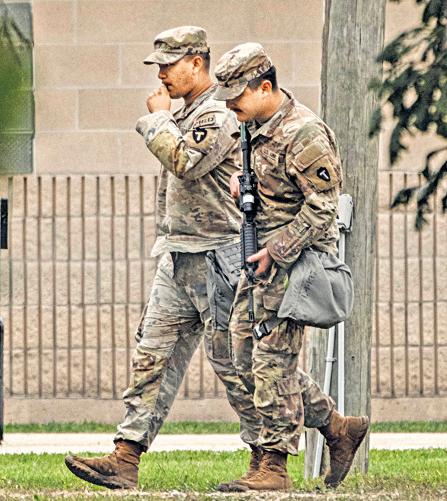 US court says troops sent to Illinois can stay, but not deploy