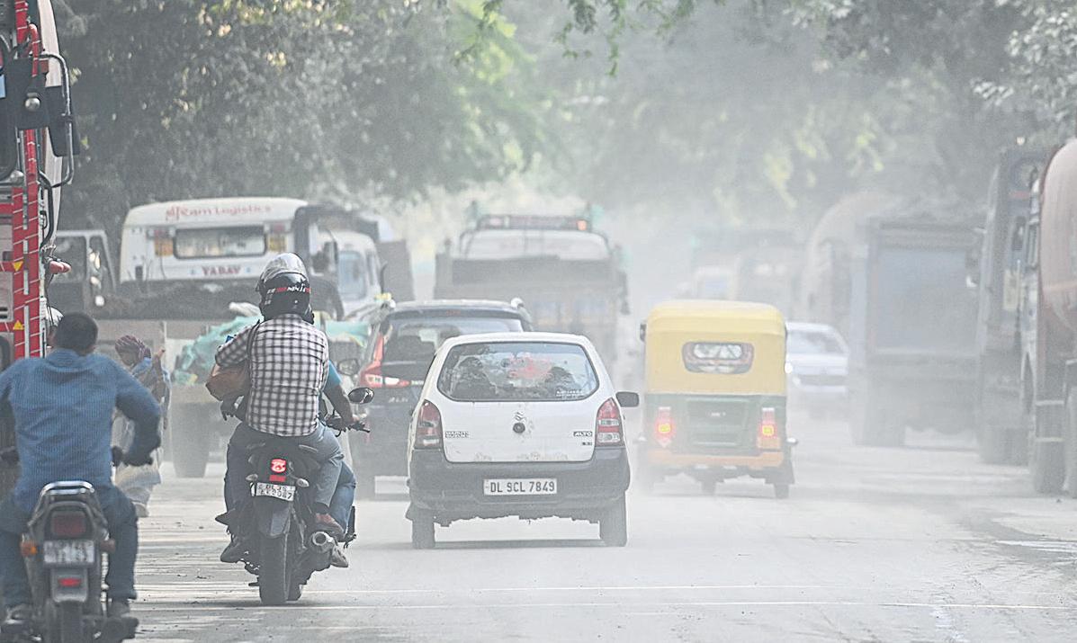 Delhi bathed in dust, norms openly flouted