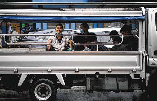 Traffic Police concerned by low take-up; call to prioritise lorries used to transport workers