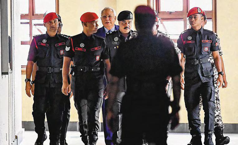Najib's bid for house arrest rattles Malaysian govt