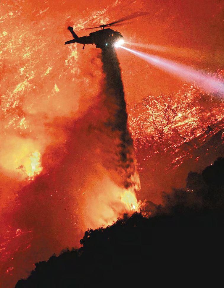 Firefighters race to beat LA fires as winds grow and death toll hits 16