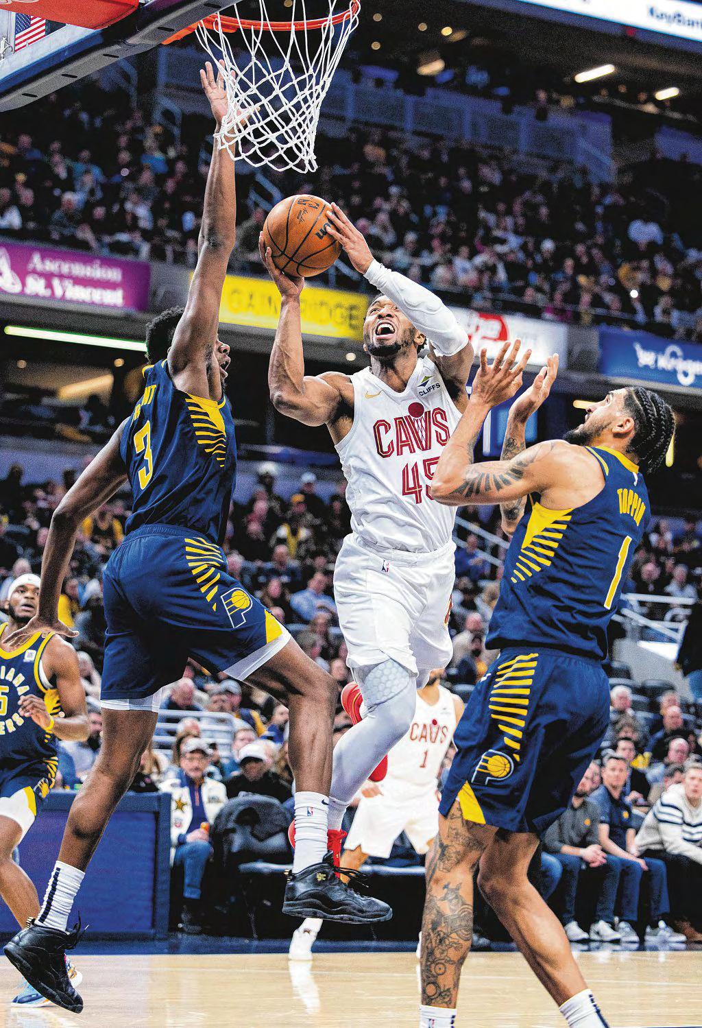 MITCHELL SETS TONE IN CAVS' REVENGE