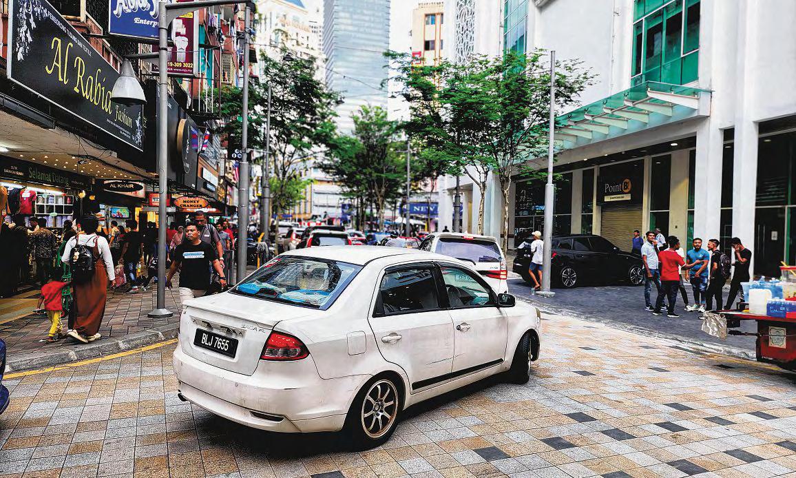 KL Shopping District Bustling Once More, Five Months After Sinkhole Tragedy
