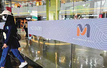 Chinese Couple Fined for Public Obscenity After Undressing at KL Airport