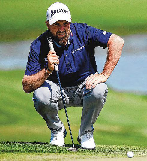 Friendship inspires Lowry to 2-stroke lead