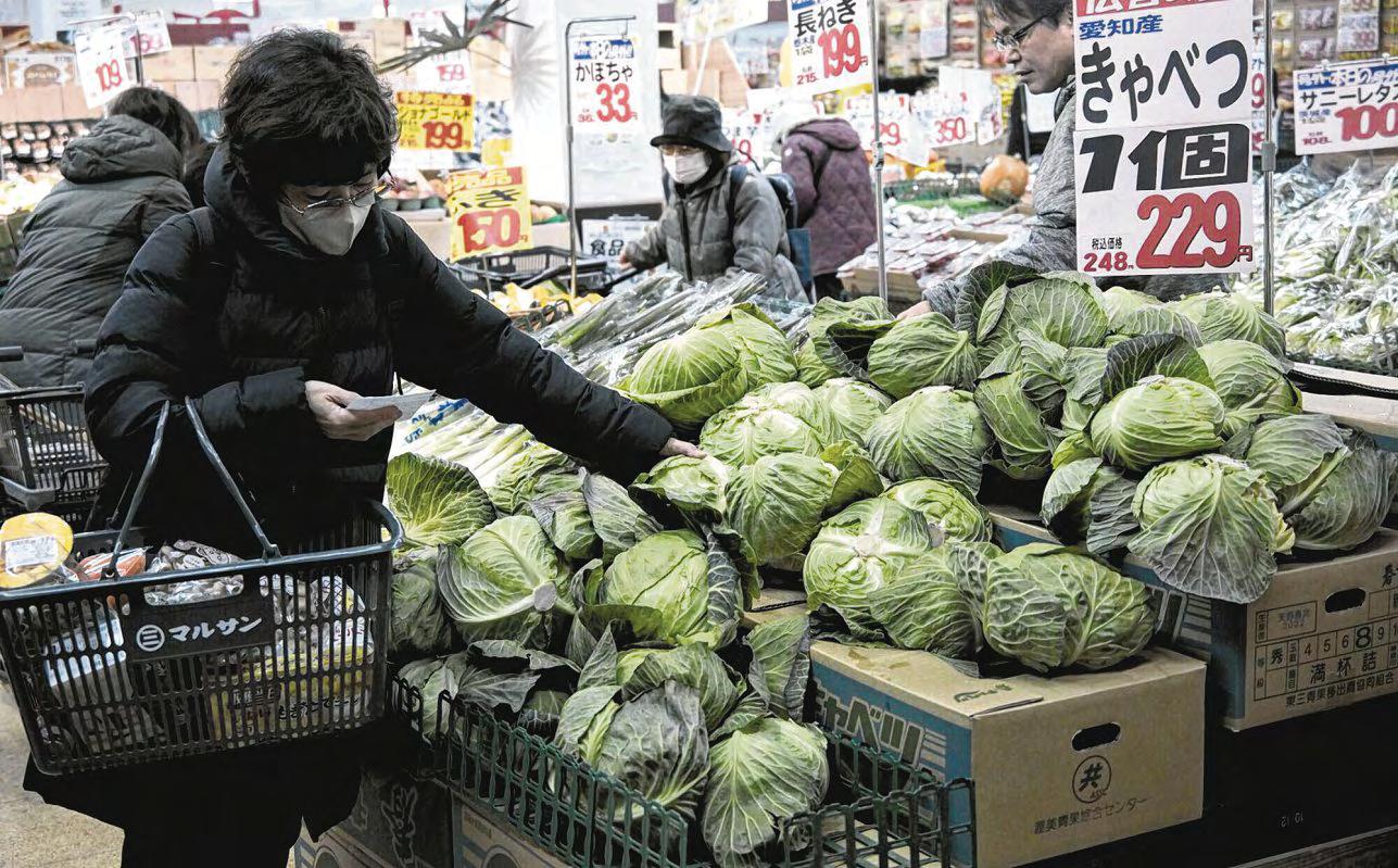 Banks boom and shoppers scrimp a year after Japan's interest rate pivot