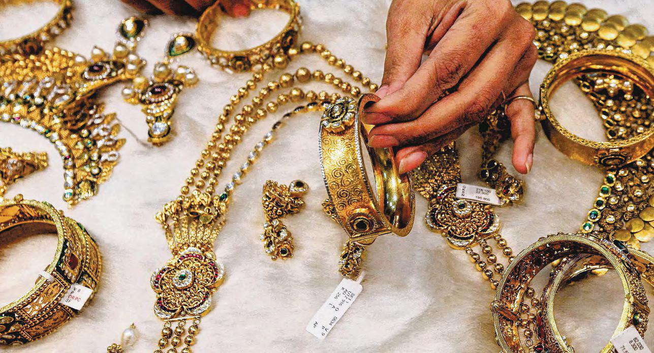 As gold prices soar, customers in Asia race to cash in jewellery, coins