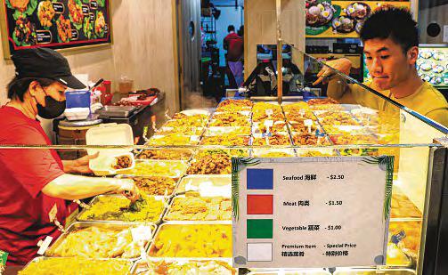 Colour-coded price labels for economy rice dishes at Koufu outlets