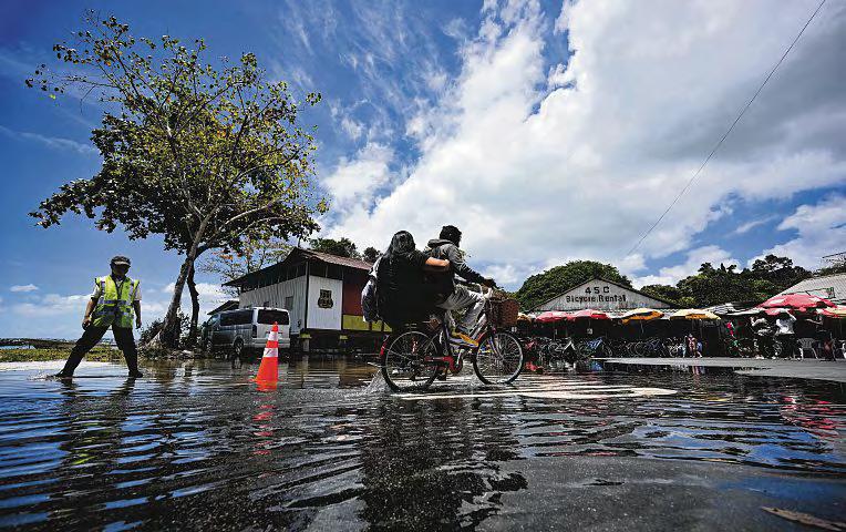 How villagers on Pulau Ubin live with floods caused by high tide
