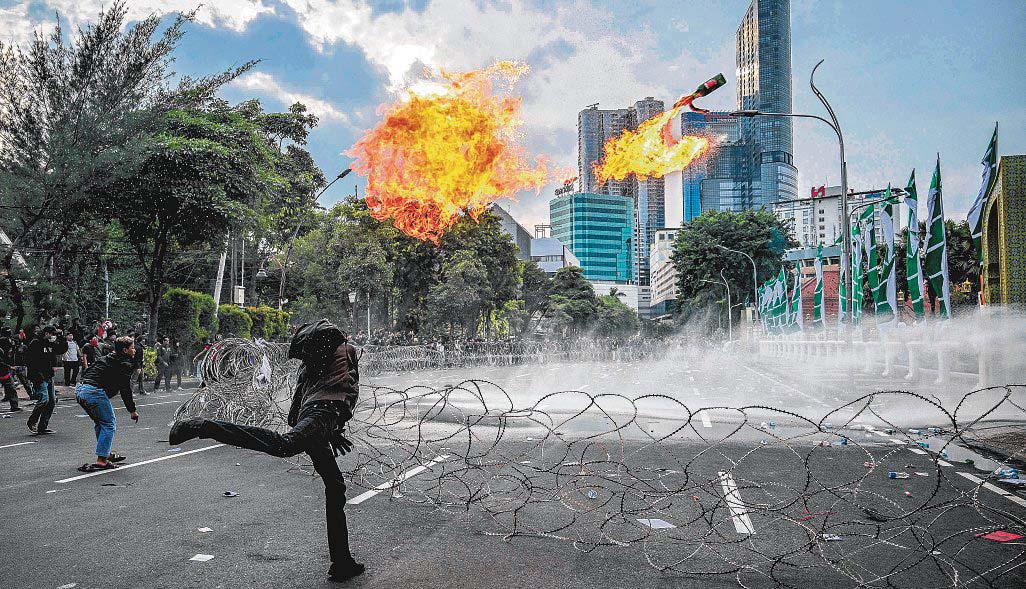 Indonesia Protesters Clash With Police at Anti-Military Law Rally
