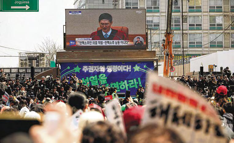 Most S. Koreans relieved, ready to move on after impeachment verdict