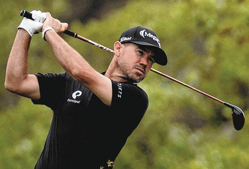 Harman braces for a fight despite hefty lead