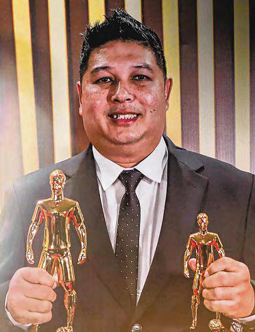 Aidil Clinches Top Award