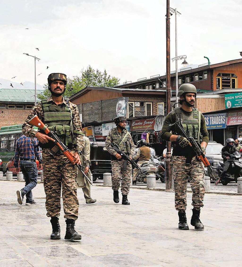 As tensions soar, Pakistan vows 'decisive response' if India launches military strike