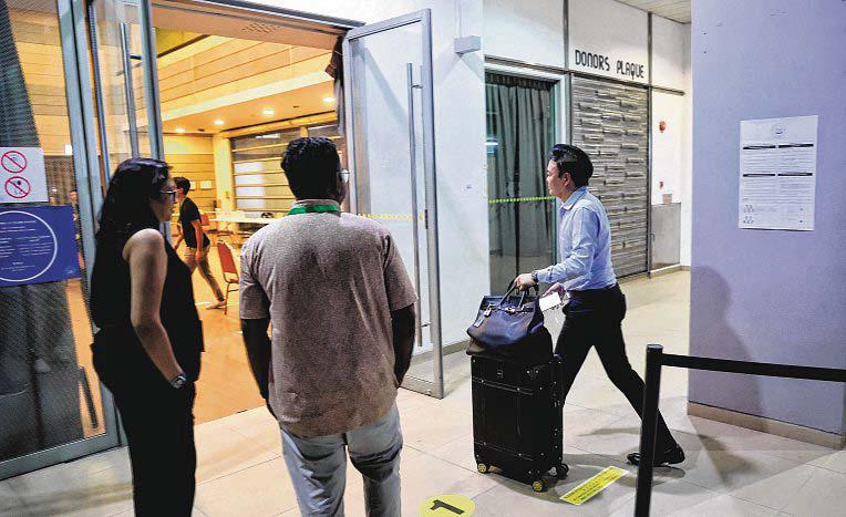 Short waiting times and no crowds as overseas Singaporeans cast their ballots