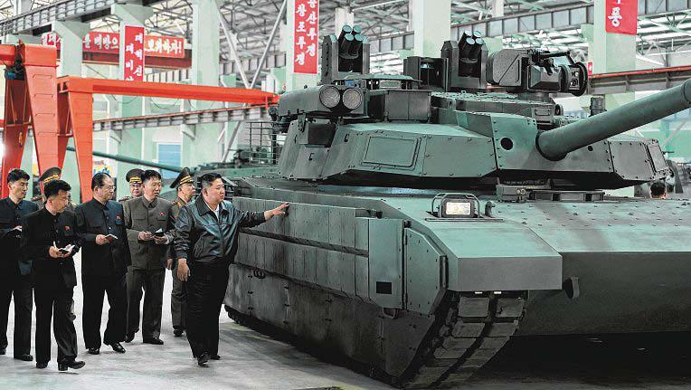 N. Korea's Kim visits tank factory, touts progress in 'Korean-style tanks'