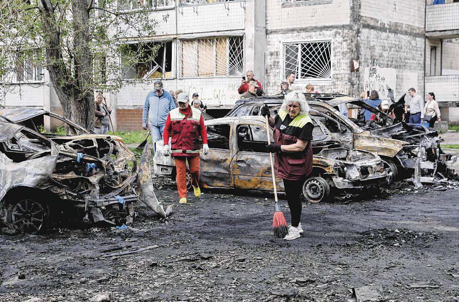 Russian Drone Attack on Kyiv Injures 11, Sparks Residential Fires