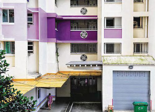 Some Tiong Bahru residents see red over HDB blocks being repainted 'gaudy' purple