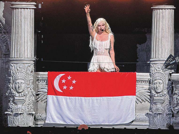 Lady Gaga returns in spectacular fashion, with S'pore flag in tow
