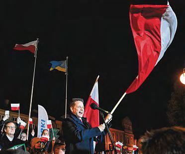 Polish Centrist Ekes Out Win in First Round of Presidential Polls