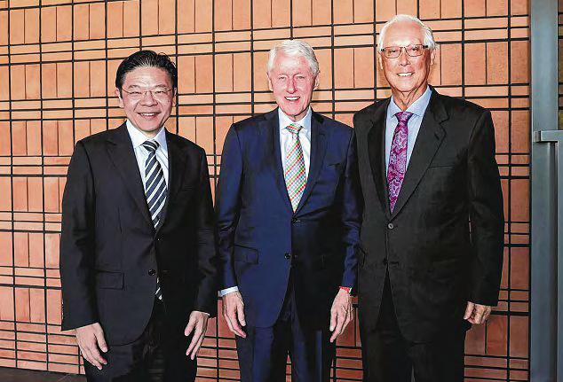 PM Wong and ex-US president Clinton discuss global and regional issues
