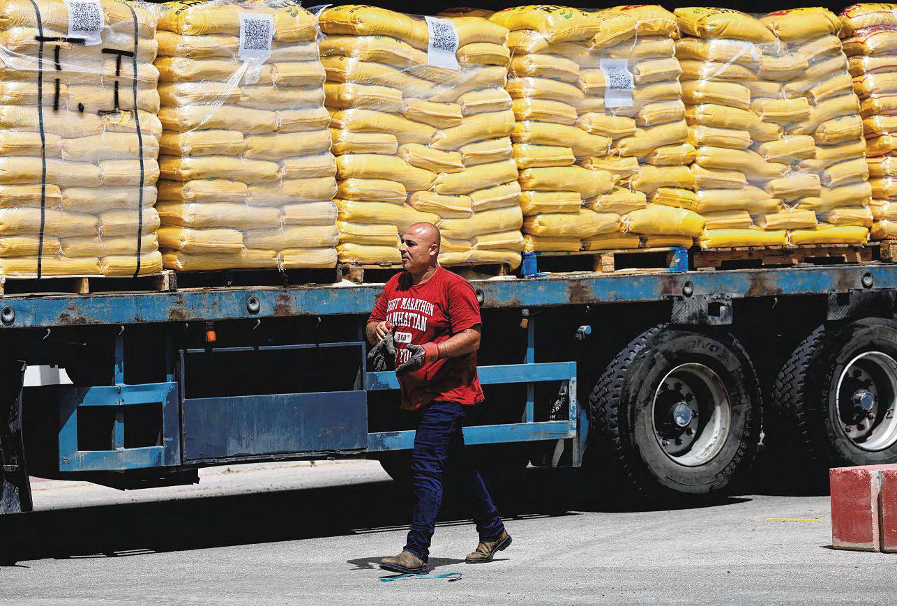 Head of Gaza aid foundation quits as strike kills dozens