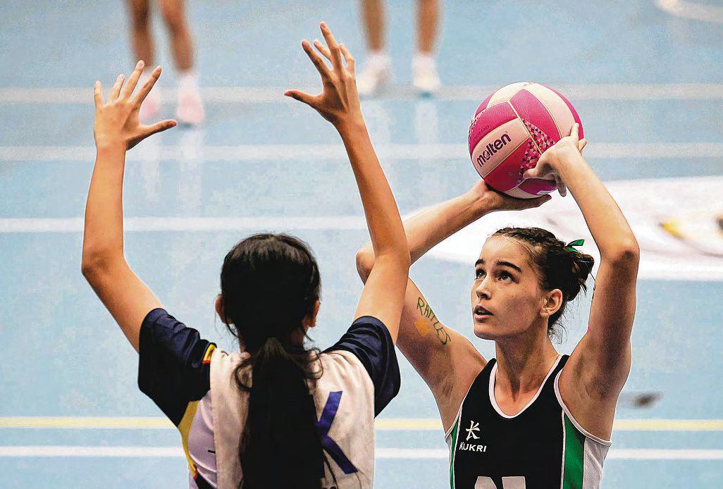 RI's Kaska adds netball gold to swimming medals