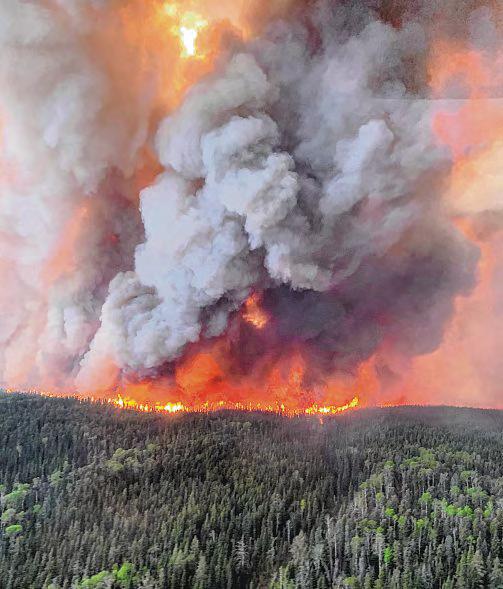 Thousands flee as Canada's Manitoba province declares wildfire emergency