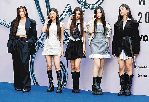 K-pop girl group NewJeans ordered to pay agency more than $933,000 for each unauthorized activity