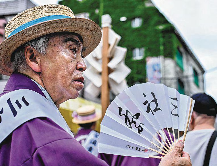 Protect workers from extreme heat or face fines, Japan tells firms