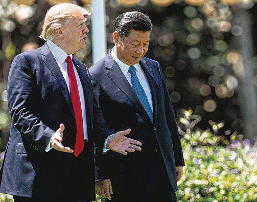 Amid trade tensions, Trump says Xi invited him to China during 'very good' phone call